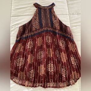 Maroon pleated and patterned high neck dressy sleeveless top